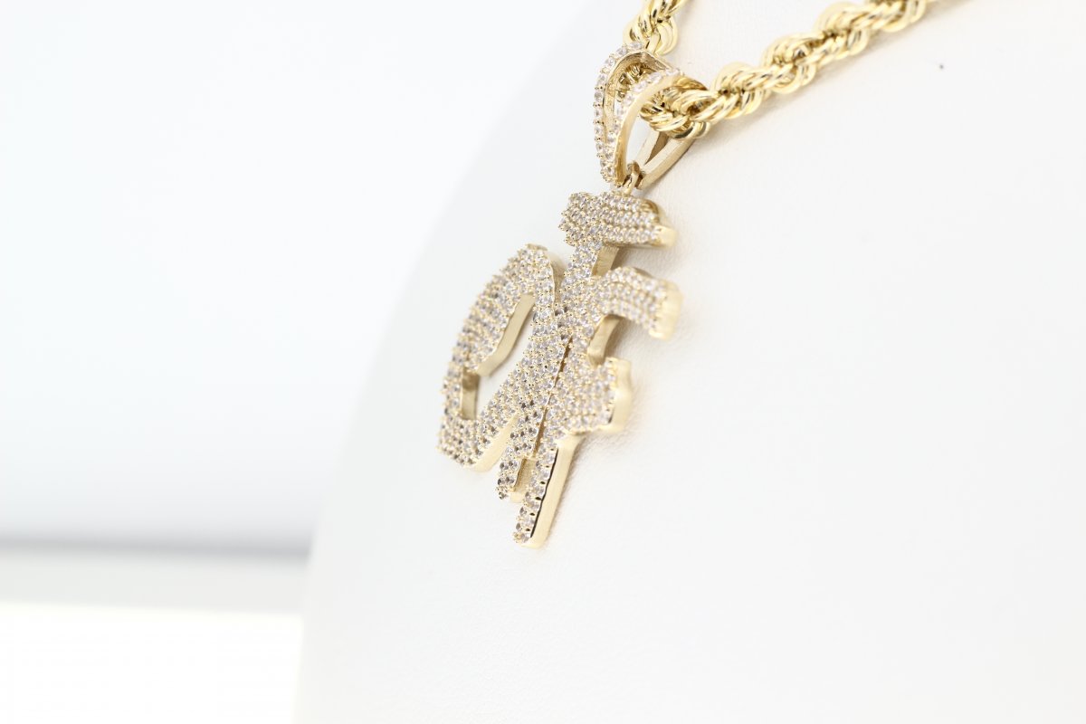 Geelgouden hanger OTF gezet met kristallen